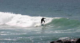 Surfer am Strand von St. Finian's Bay